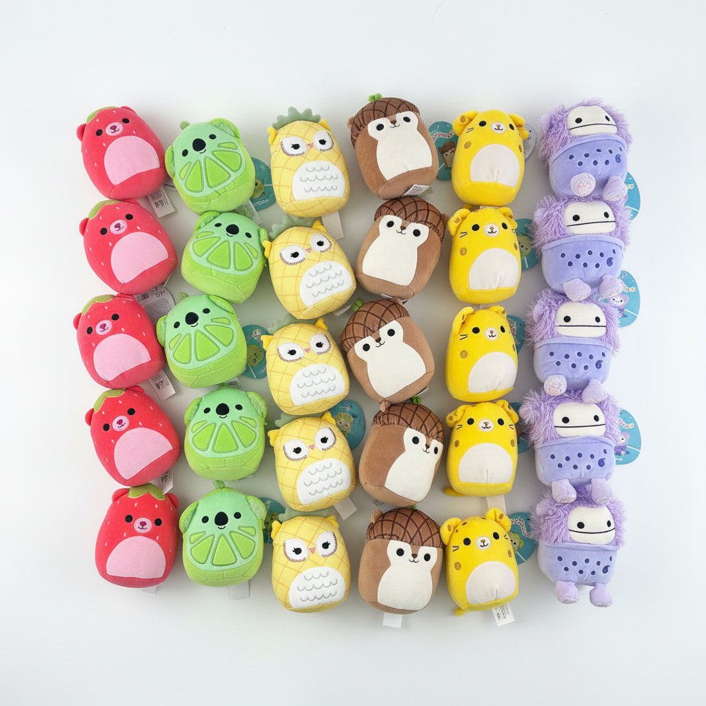 Collection of colorful animal-shaped erasers on a white background