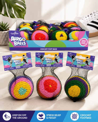 A display box with foot bags and 3 foot bags in front in mesh package with hang tags 