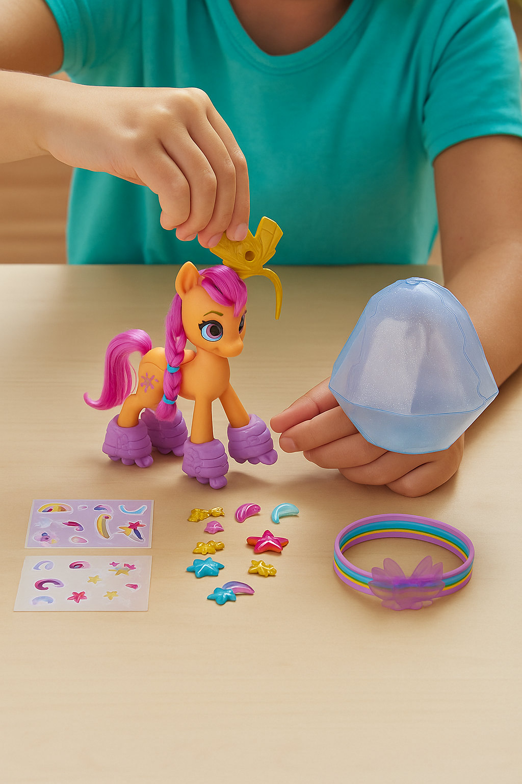 Child playing with a toy pony and accessories on a table