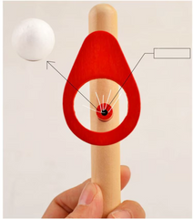 Wooden toy with floating ball and red target.