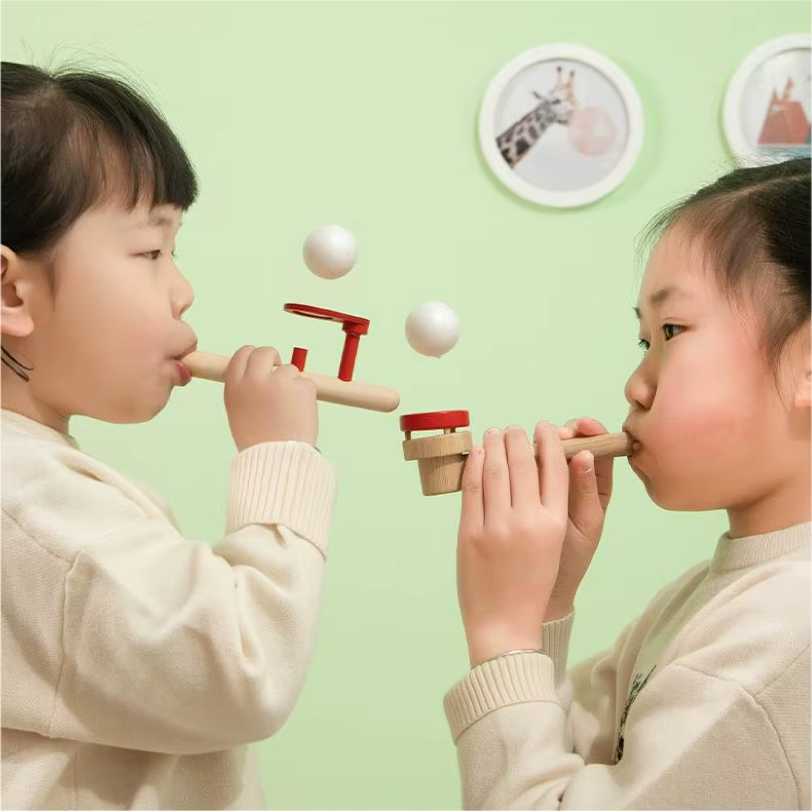 Kids playing floating ball game.