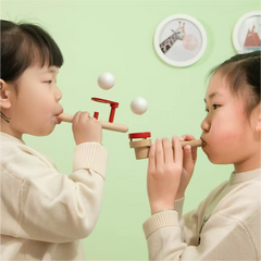 Kids playing floating ball game.