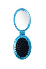 Blue handheld mirror with black brush head on a white background
