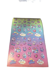 Colorful sticker book open on a white background