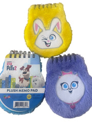 Two plush memo pads with cartoon designs on a white background
