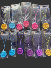 Multiple packages of bubble wands with colorful nozzles on a black background