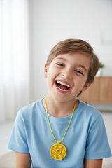 child wearing yellow bubble pop necklace