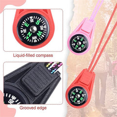 Red and pink compasses with close-up details on a blurred natural background