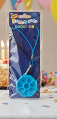 Blue bubble pop fidget necklace in package onbirthday party table. 