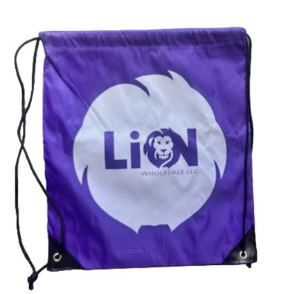 Purple drawstring bag with a white logo on a textured surface