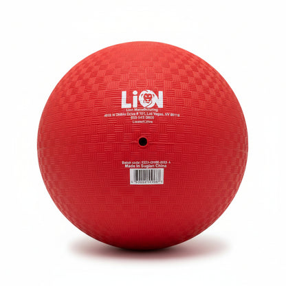 Red 8.5" Playground ball with a brand label on a textured surface