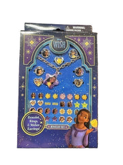 Disney jewelry set packaging on a wooden surface