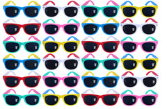 Grid of 50 colorful kids’ UV sunglasses with black lenses, sized for ages 3–6. UV 400 protection. Arranged in 6 neat rows.