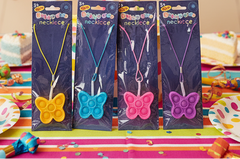 Four packages of butterfly necklaces with colorful butterflies on a white background