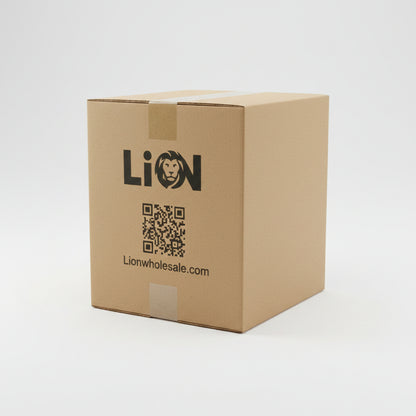 A stack of brown cardboard boxes wrapped in clear plastic stretch wrap and secured with green strapping, stored on a warehouse shelf next to a green metal rack.