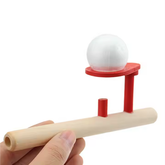 Floating ball game with a white ball on a red platform.