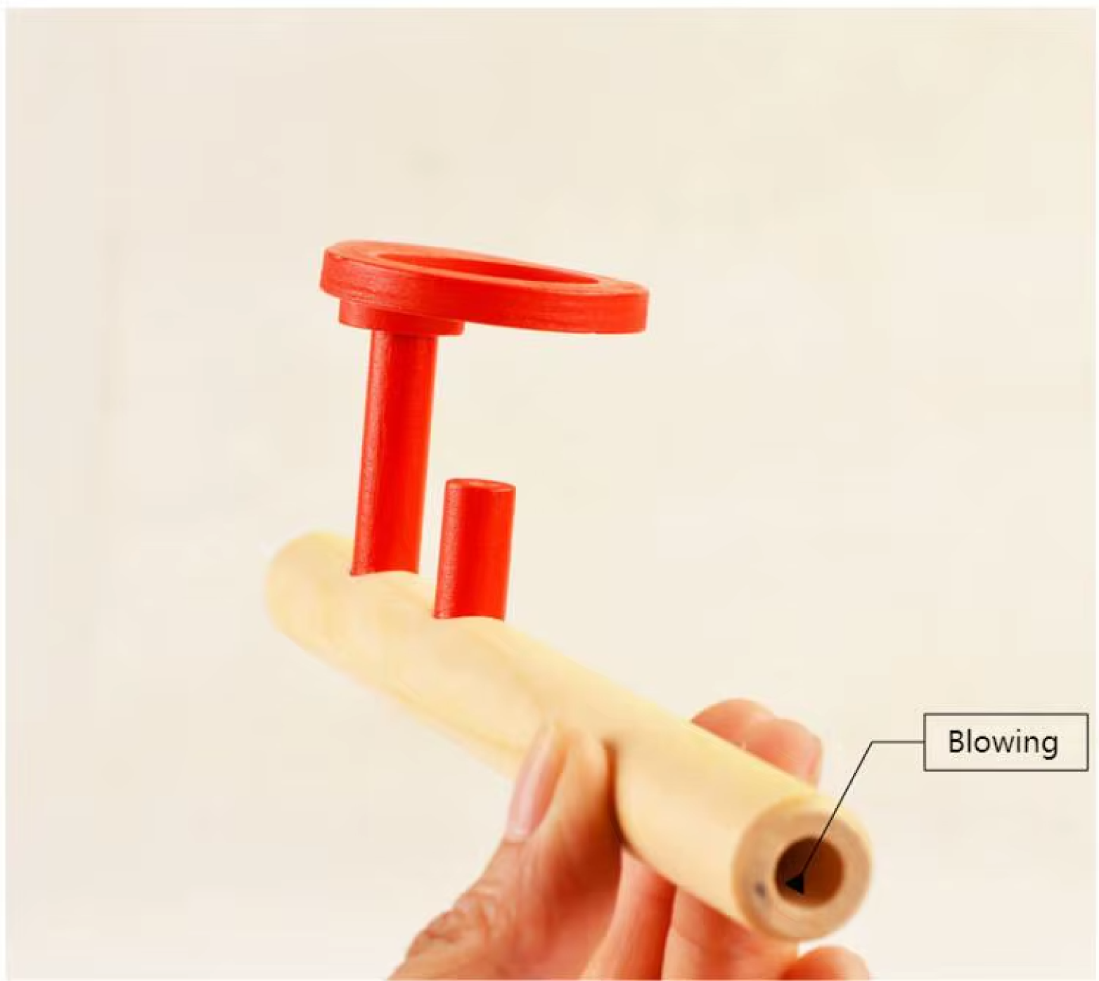 Floating ball game being blown