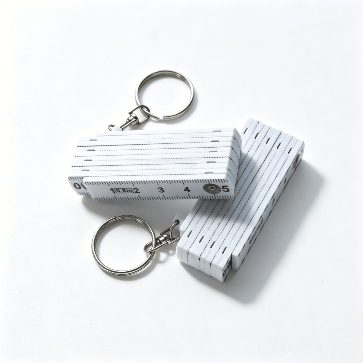 Folding Ruler Keychain | English & Metric | Extends - Lion Wholesale