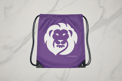 purple drawstring bag with a white lion logo on a light gray background