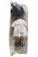 Plush toy in a clear package with a warning label on a white background